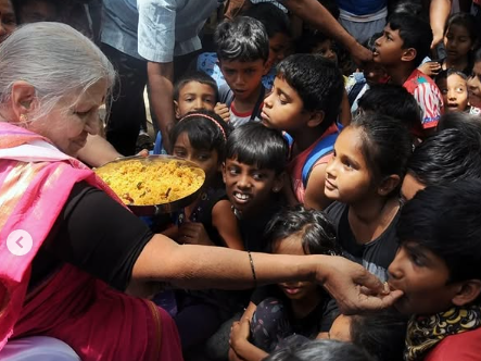 Sindhutai Sapkal feeding the orphans